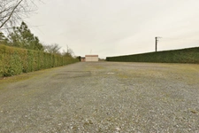 Terrain de 6 000 m² avec bâtiment de 250 m² – À 15 km de Laval