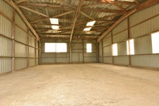 Terrain de 6 000 m² avec bâtiment de 250 m² – À 15 km de Laval