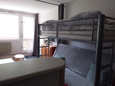 Studio 24 m² avec balcon, cellier, et casier à ski.