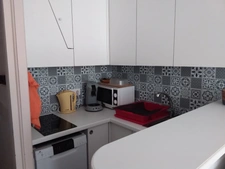 Studio 24 m² avec balcon, cellier, et casier à ski.