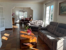 Dans le departement 64 une maison de type contemporain 8 pièces sur 198 m² et 2000 m² de terrain arboré, avec trois places de garage.  