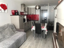 Dpt Hautes Pyrénées, dans la station de ski de LA MONGIE appartement T 2 de 29 m² avec balcon, cellier et parking intérieur.   