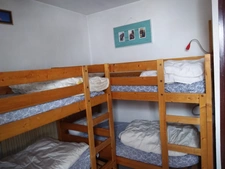 Appartement à vendre 2 pièces LA MONGIE (65), avec cellier, casier à ski, terrasse, et parking intérieur.
