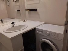 Studio 24 m² avec balcon, cellier, et casier à ski.