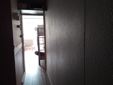 Studio 24 m² avec balcon, cellier, et casier à ski.