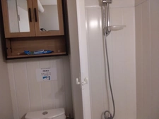 Studio 24 m² avec balcon, cellier, et casier à ski.