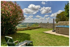 Dpt Tarn et Garonne (82), for sale LAUZERTE stone town house 9 rooms of 205m ² with garden and garage.