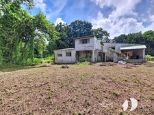 Petit-Bourg – Maison 5 chambres à rénover avec fort potentiel sur terrain constructible de 2 300 m²
