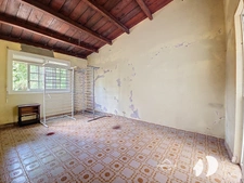Petit-Bourg – Maison 5 chambres à rénover avec fort potentiel sur terrain constructible de 2 300 m²