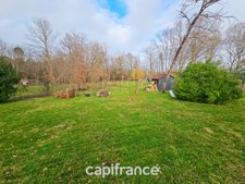 Maison de plain pied de 141m², 4 chambres, bureau, jardin, double garage, terrain de 1440m²