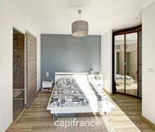 Maison de plain pied de 141m², 4 chambres, bureau, jardin, double garage, terrain de 1440m²