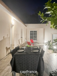 Maison de plain pied de 141m², 4 chambres, bureau, jardin, double garage, terrain de 1440m²