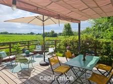 A Cézac, jolie maison en pierre rénovée, terrain de 447m², piscine