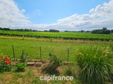 A Cézac, jolie maison en pierre rénovée, terrain de 447m², piscine