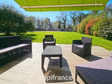 Maison de plain pied de 141m², 4 chambres, bureau, jardin, double garage, terrain de 1440m²