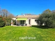 Maison de plain pied de 141m², 4 chambres, bureau, jardin, double garage, terrain de 1440m²
