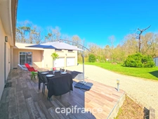 Maison de plain pied de 141m², 4 chambres, bureau, jardin, double garage, terrain de 1440m²