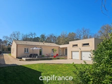 Maison de plain pied de 141m², 4 chambres, bureau, jardin, double garage, terrain de 1440m²
