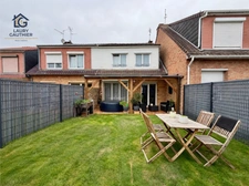 HOUPLINES BOURG — Maison rénovée avec 3 chambres, jardin exposé sud et garage