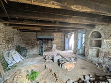 PLOUAY MAISON EN PIERRE SOUS ARDOISES 1 PIÈCE DE 50M² ENVIRON PARCELLE DE 140m² ENVIRON AVEC UN PUITS