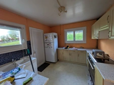 LOCMALO MAISON DE 5 PIÈCES 132 M² ENVIRON EN REZ DE CHAUSSÉE SURÉLEVÉ PARCELLE CLÔTURÉE D'ENVIRON 1500m²