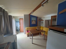 AMBON MOBIL-HOME DE 26m² ENVIRON 2 CHAMBRES AVEC TERRASSE BOIS SUR L'EXTÉRIEUR ET ABRIS DE JARDIN PARCELLE DE 200m² ENVIRON