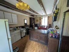 GUEMENE SUR SCORFF MAISON BOURGEOISE À RÉNOVER DE 5 PIÈCES 131M² ENVIRON TROIS DÉPENDANCES EN PIERRE SOUS ARDOISE PARCELLE DE 1740M²