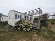 AMBON MOBIL-HOME DE 26m² ENVIRON 2 CHAMBRES AVEC TERRASSE BOIS SUR L'EXTÉRIEUR ET ABRIS DE JARDIN PARCELLE DE 200m² ENVIRON