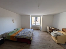 GUEMENE SUR SCORFF IMMEUBLE DE 239M² ENVIRON COMPOSÉ DE DEUX APPARTEMENTS ET UNE SURFACE COMMERCIALE PARCELLE DE 533m²