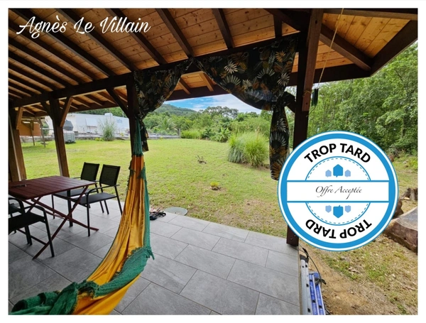 Terrain Plat avec petite maison proche Plage de Grande Anse