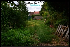 Maison de ville de 110m² avec jardin à fort potentiel - Spécial investisseur ou bricoleur