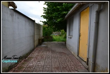 Maison de ville de 110m² avec jardin à fort potentiel - Spécial investisseur ou bricoleur