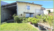VILLAGE HOUSE for sale, 7 rooms including 5 BEDROOMS, LOULAY (17) with OUTBUILDINGS (garage 54m² + covered area)
