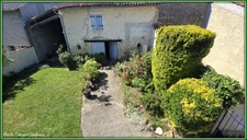 VILLAGE HOUSE for sale, 7 rooms including 5 BEDROOMS, LOULAY (17) with OUTBUILDINGS (garage 54m² + covered area)