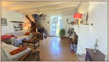 VILLAGE HOUSE for sale, 7 rooms including 5 BEDROOMS, LOULAY (17) with OUTBUILDINGS (garage 54m² + covered area)