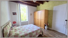 VILLAGE HOUSE for sale, 7 rooms including 5 BEDROOMS, LOULAY (17) with OUTBUILDINGS (garage 54m² + covered area)