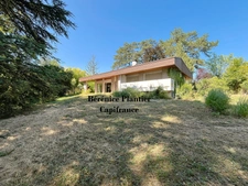 Maison à rénover et parcelle en zone UH