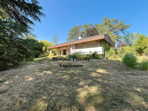 Maison à rénover et parcelle en zone UH