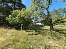 Maison à rénover et parcelle en zone UH