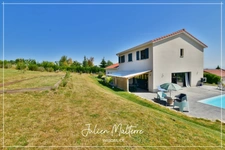 Recent house of 170 m² on 2100 m² of preserved land, 7 rooms, 5 bedrooms including dressing room, 85 m² garage in MAROLS (42)