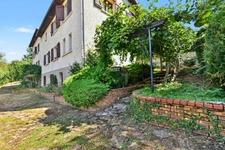 Grande maison familiale de 330 m² Carrez sur 1400 m² de terrain - 4 chambres, sous-sol complet et combles aménagés