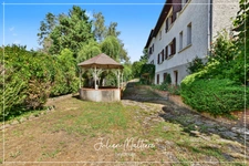 Grande maison familiale de 330 m² Carrez sur 1400 m² de terrain - 4 chambres, sous-sol complet et combles aménagés