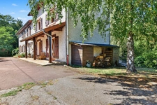 Grande maison familiale de 330 m² Carrez sur 1400 m² de terrain - 4 chambres, sous-sol complet et combles aménagés