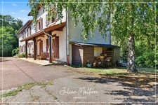 Grande maison familiale de 330 m² Carrez sur 1400 m² de terrain - 4 chambres, sous-sol complet et combles aménagés