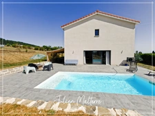 Recent house of 170 m² on 2100 m² of preserved land, 7 rooms, 5 bedrooms including dressing room, 85 m² garage in MAROLS (42)
