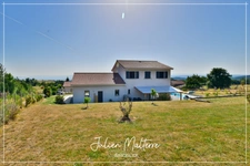 Recent house of 170 m² on 2100 m² of preserved land, 7 rooms, 5 bedrooms including dressing room, 85 m² garage in MAROLS (42)
