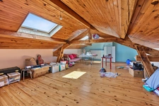 Grande maison familiale de 330 m² Carrez sur 1400 m² de terrain - 4 chambres, sous-sol complet et combles aménagés
