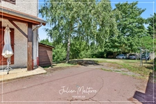 Grande maison familiale de 330 m² Carrez sur 1400 m² de terrain - 4 chambres, sous-sol complet et combles aménagés