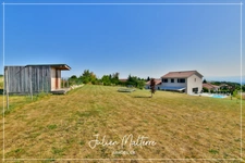 Recent house of 170 m² on 2100 m² of preserved land, 7 rooms, 5 bedrooms including dressing room, 85 m² garage in MAROLS (42)