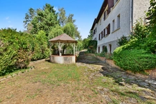 Grande maison familiale de 330 m² Carrez sur 1400 m² de terrain - 4 chambres, sous-sol complet et combles aménagés